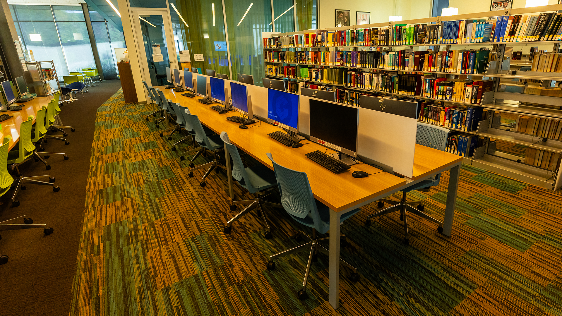 Inside Library computers on long tables