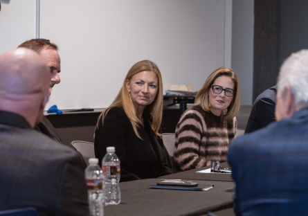 Senator Kyrsten Sinema listens next to the Interim President of GateWay, Dr. Amy Diaz.