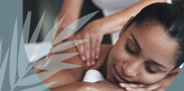 Woman having shoulders massaged. 