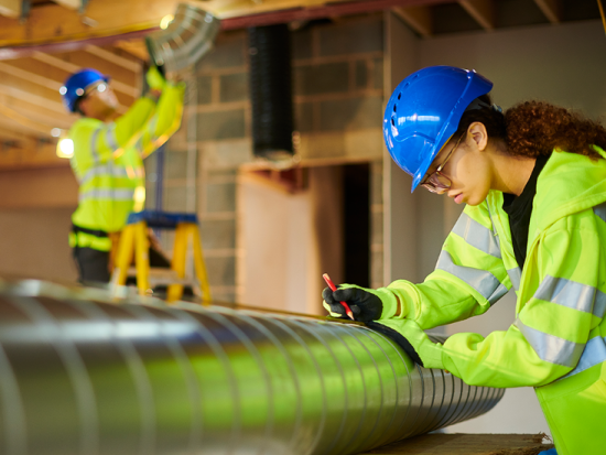 Male and female HVAC workers