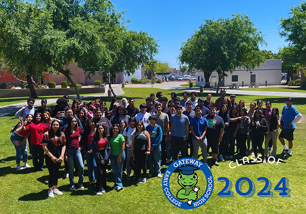 Group of student standing on grassy lawn