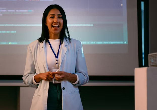 Female teacher presenting to a class