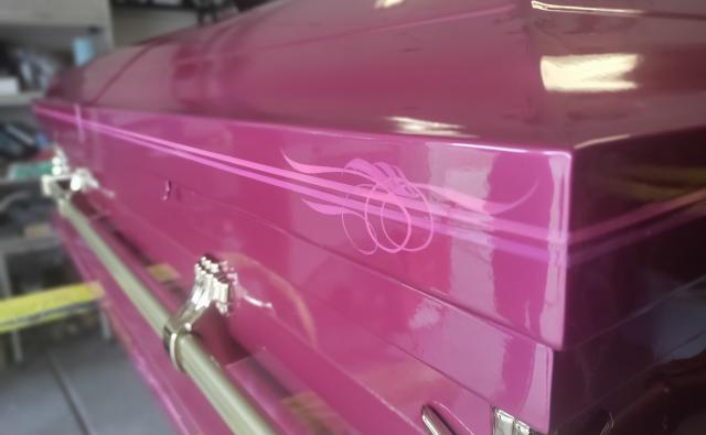 Stencil on pink casket